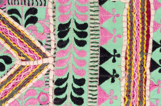 Old colorful  Oriental fabric with geometric pattern