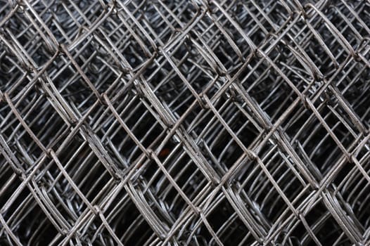 metal netting mesh in several layers, selective focus