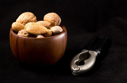 fruit bowl with nuts and nutcracker