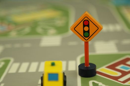 wooden mini traffic light and the car