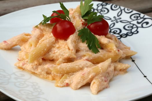 pasta penne regate with italian ricotta cheese and cherry tomatoes