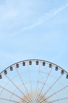 Ferris wheel with blue sky