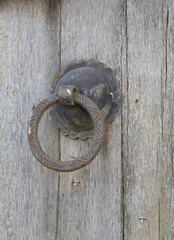 doorknob on the old wooden tunisian door - background