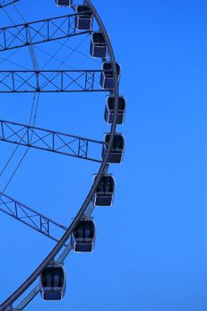 Ferris wheel with blue sky