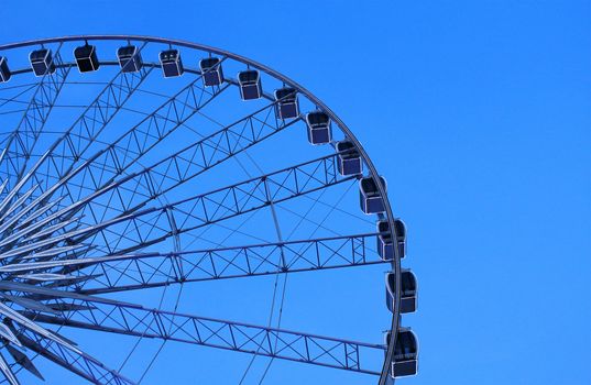 Ferris wheel with blue sky