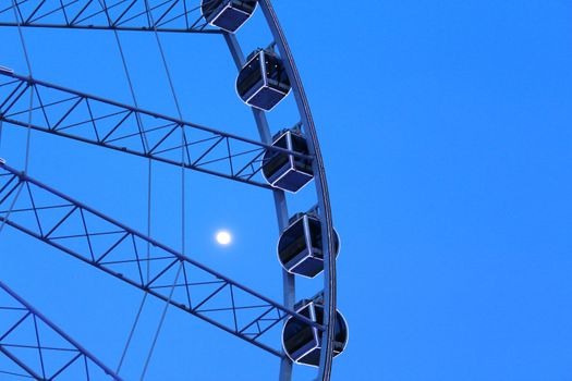 Ferris wheel with blue sky