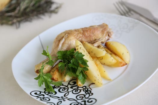 Chicken and potatoes baked in the stove