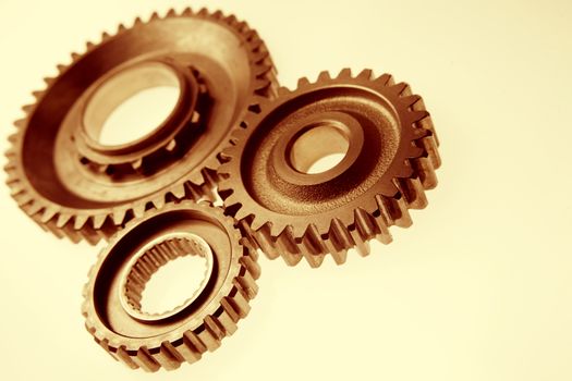 Metal cog gears bonding together 