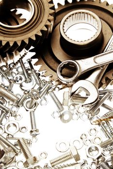 Steel gears, nuts, bolts, and wrenches