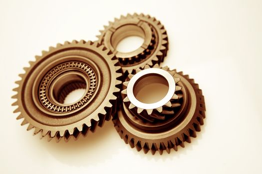 Closeup of three metal cog gears