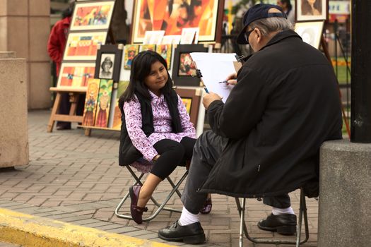 LIMA, PERU - SEPTEMBER 25, 2011: Unidentified street artist drawing a picture of an unidentified young Peruvian girl on September 25, 2011 in the district of Miraflores in Lima, Peru 