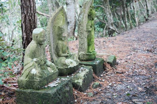 Japanese God Idol in woods, nobody