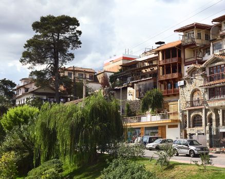 CUENCA, ECUADOR - FEBRUARY 13, 2014: View onto the Av. 3 de Noviembre along the side of the river Tomebamba on February 13, 2014 in Cuenca, Ecuador