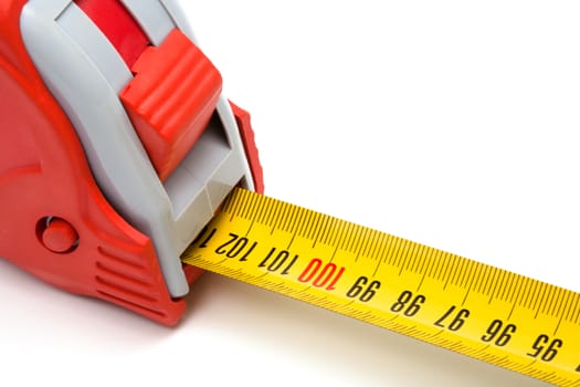 Red new tape-measure on a white background