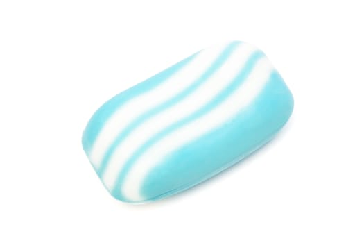 a piece of blue soap on a white background