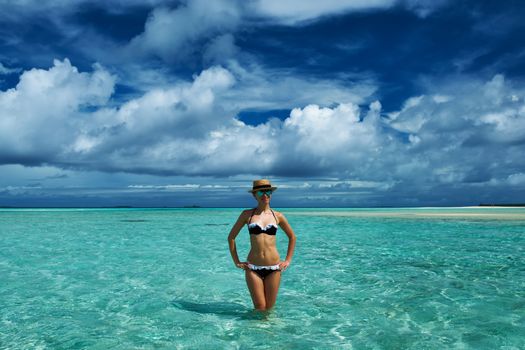 Woman in bikini at tropical beach