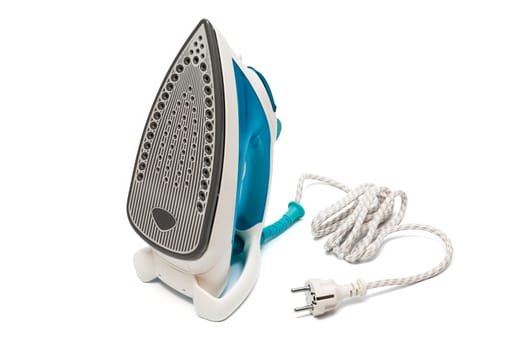 Modern electric iron on a white background