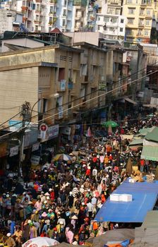 DA LAT, VIET NAM- FEB 8: Crowded, busy scene 's market with crowd of people go to markets to buy goods repair for Tet (Lunar New Year) in Da Lat, Viet Nam on February 8, 2013