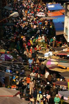 DA LAT, VIET NAM- FEB 8: Crowded, busy scene 's market with crowd of people go to markets to buy goods repair for Tet (Lunar New Year) in Da Lat, Viet Nam on February 8, 2013