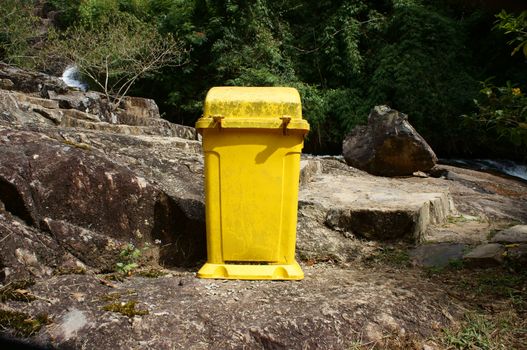 Dustbin at tourist area to remind  enviromental protection sense, let's put trash into trashcan to have green, clean, beauty enviroment