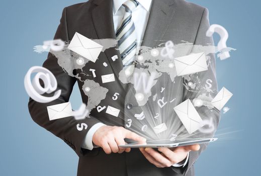 Man in suit holding tablet pc. Envelopes and letters are emitted from the screen tablet. The concept of mailing