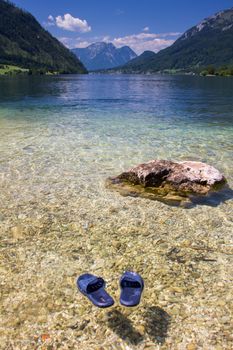 Slippers on the surface of the lake