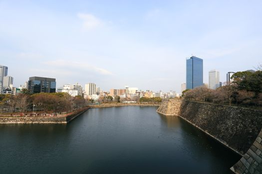 a wide view of osaka city on top of osaka castle