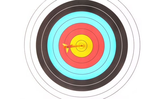 Archery target with arrow on white background
