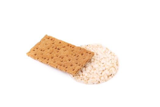 Crispbread and corn cracker. Isolated on a white background.