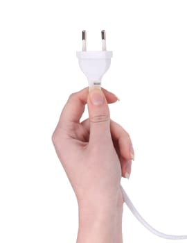 Hand holds electric plug. Isolated on a white background.