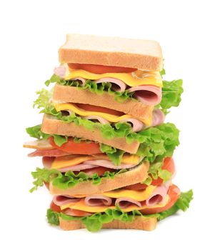 Big sandwich with vegetables. Isolated on a white background.