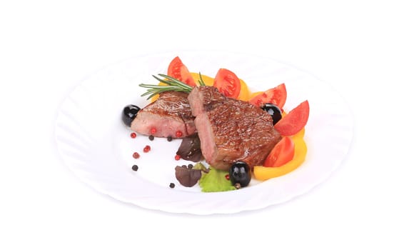 Grilled steak with fresh vegetables.