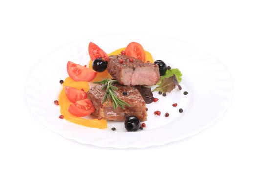 Grilled steak with fresh vegetables.