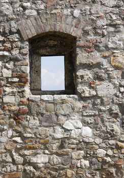 The medieval castle fortress stone wall window.