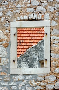 Window without casements on the stone wall