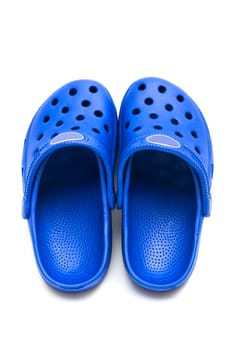 blue rubber shoes on a white background