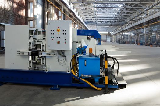 new and powerful metalworking machine in modern workshop