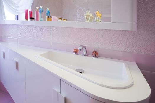 modern purple bathroom in a modern apartment