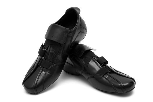 Black low shoes on a white background