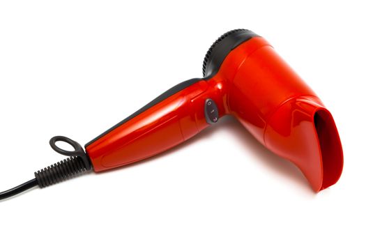 beautiful red hair dryer on a white background
