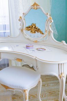 white dressing table in a modern bedroom