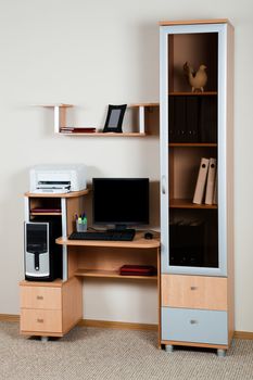 Modern computer on a wooden desk at office