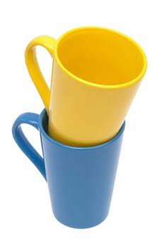 yellow and blue mug on a white background