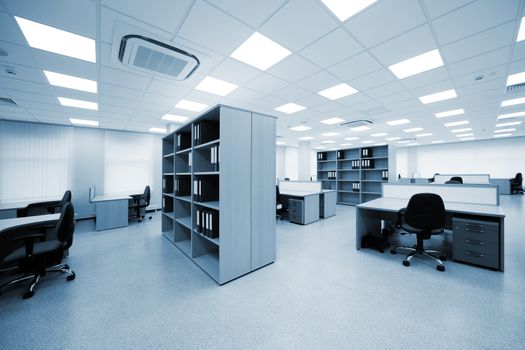 desks and bookcases in the modern office