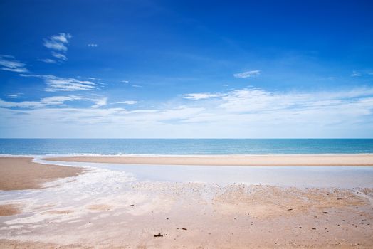 Tropical white sandy beach at sunny day.