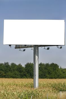 Empty billboard on background of sunset sky for your advertisement