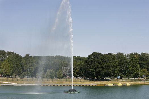 water fountain with blue sky on lake Ada Ciganlija 