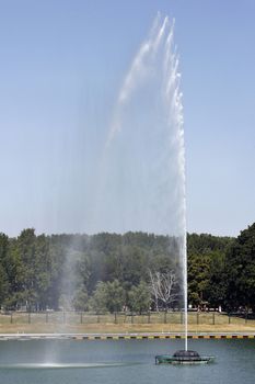 water fountain with blue sky on lake Ada Ciganlija 