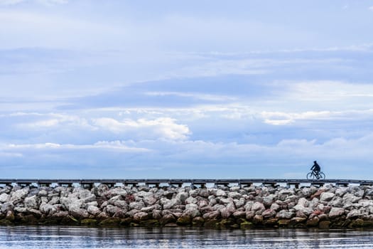 Path over a Rock Pier at the Sunset in Gaspe Peninsula