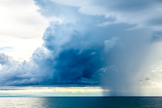 Rain Clouds at the Sea Horizon in the late afternoon